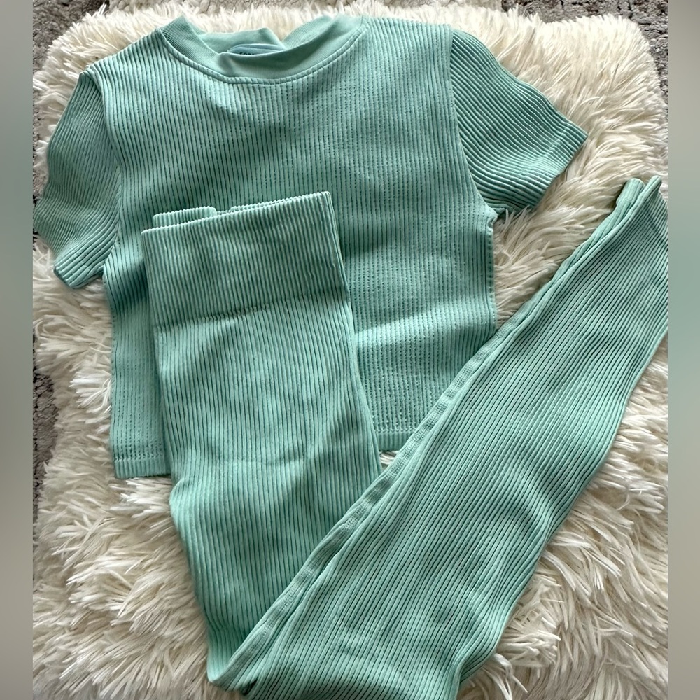 Bright mint color workout set.